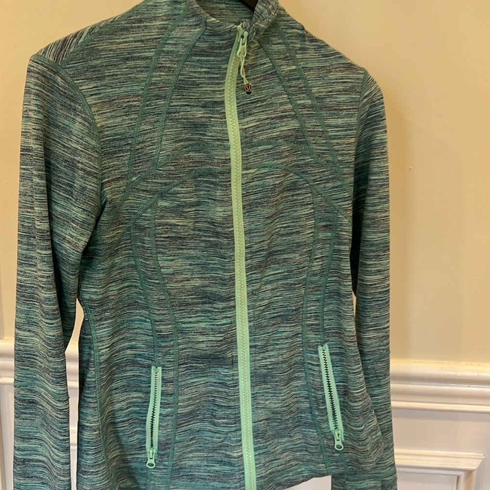 Lululemon Workout jacket in mixed colors - size 10. great condition.